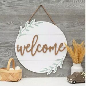NWT- 17x 15-1/2”- Round White Wooden- Welcome Sign with Green Leaves